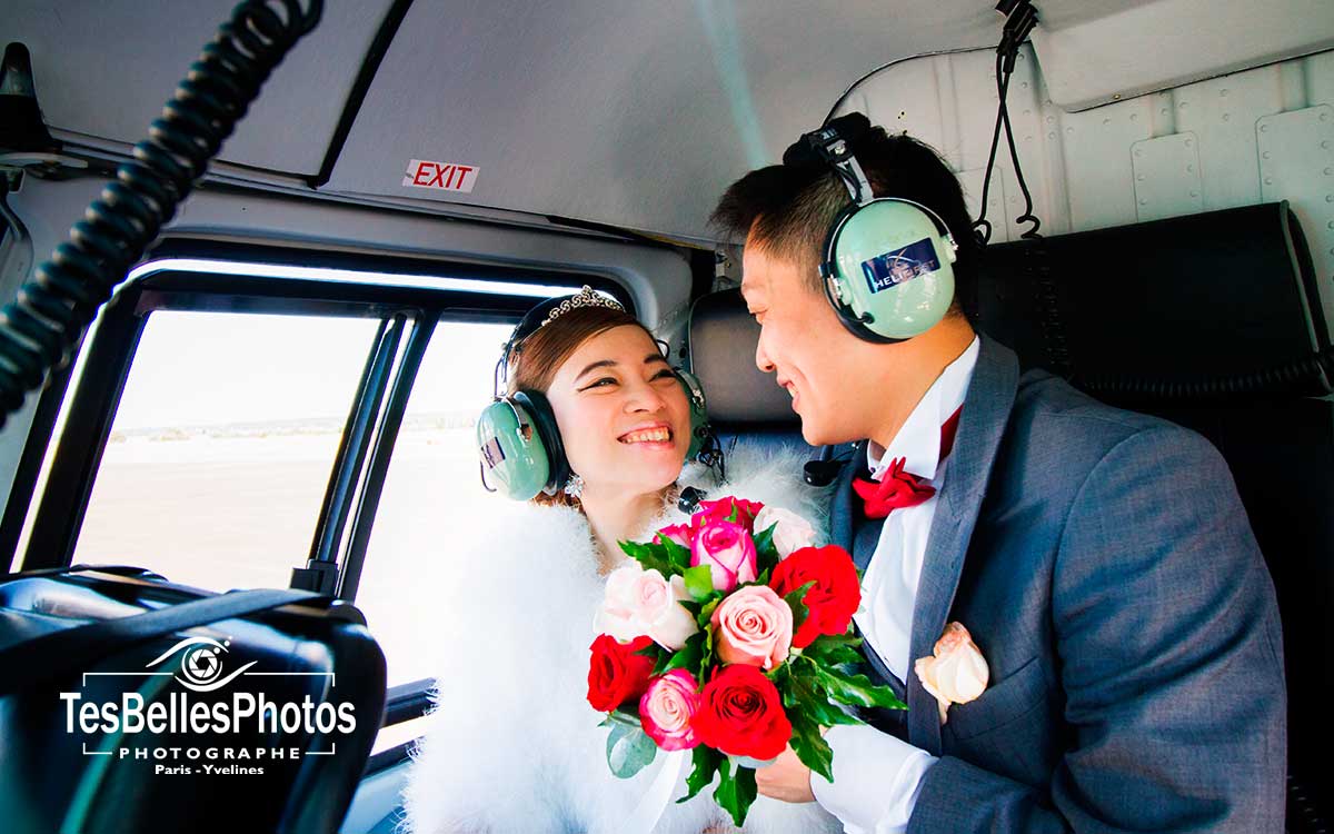 Photo shooting couple chinois à bord d'un hélicoptère, séance engagement pré-mariage en Love Session survol en hélicoptère